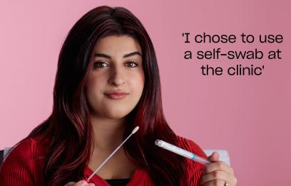 Woman holding a self-swab 